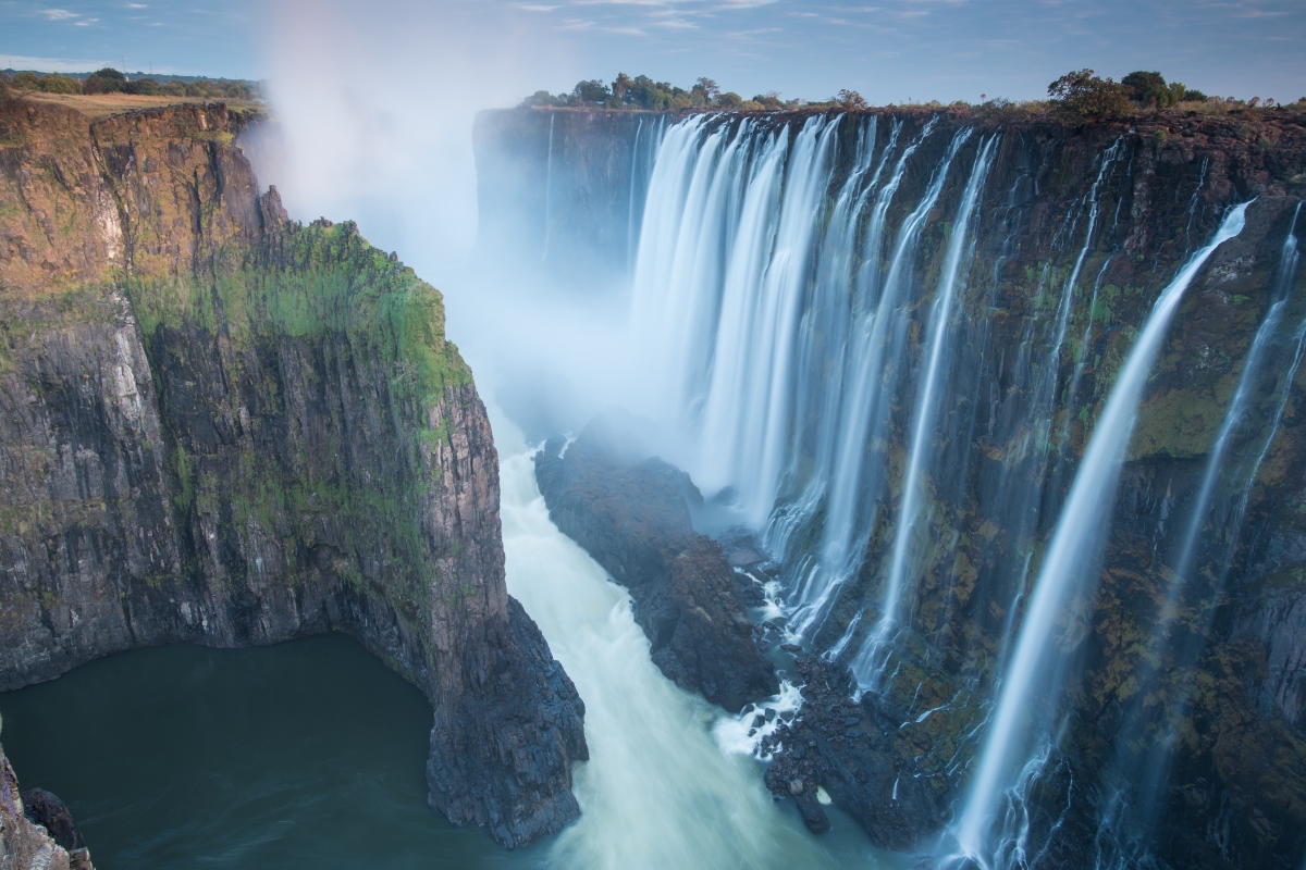 early-morning-at-victoria-Falls-from-zambia-looking-into-zimbabwe_233195226 Early morning view of Victoria Falls from Zambia looking into Zimbabwe